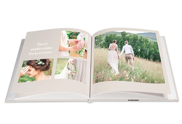 Personalisiertes ROSSMANN Fotobuch mit stabilem Hardcover und eigenem Design, ideal zum Festhalten besonderer Erinnerungen.