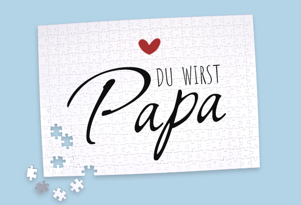 Ein weißes Puzzle mit der Botschaft „Du wirst Papa“ als originelles und individuelles Babygeschenk zur Geburt.