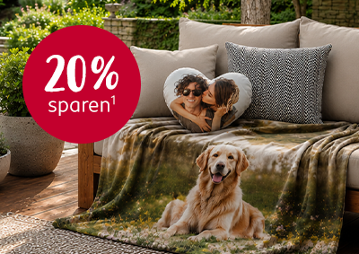 Produkte des Monats Kuscheldecke & Herzkissen gemütlich auf einer Terrasse platziert.