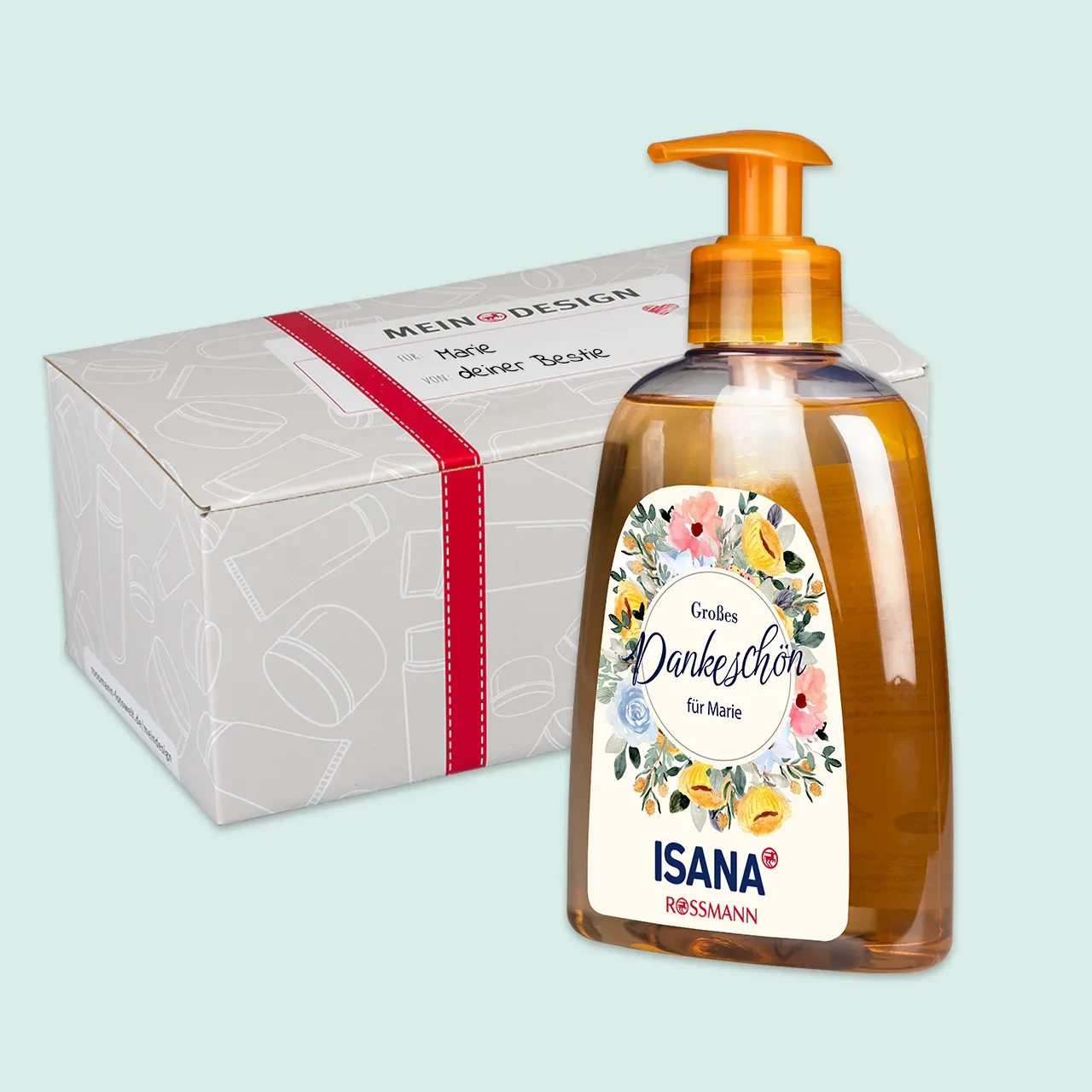 Eine Küchenseife mit personalisiertem Etikett und floralem Dankeschön-Schriftzug, platziert neben einer Geschenkverpackung.