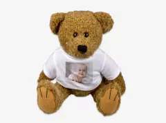 Kuscheltier mit Foto als flauschiger Wegbegleiter Euer Kuscheltier mit Foto ist ein flauschiger Wegbegleiter für alle Altersgruppen. Mit eurem Lieblingsfoto bedruckt wird es ein einzigartiges Erinnerungsstück.