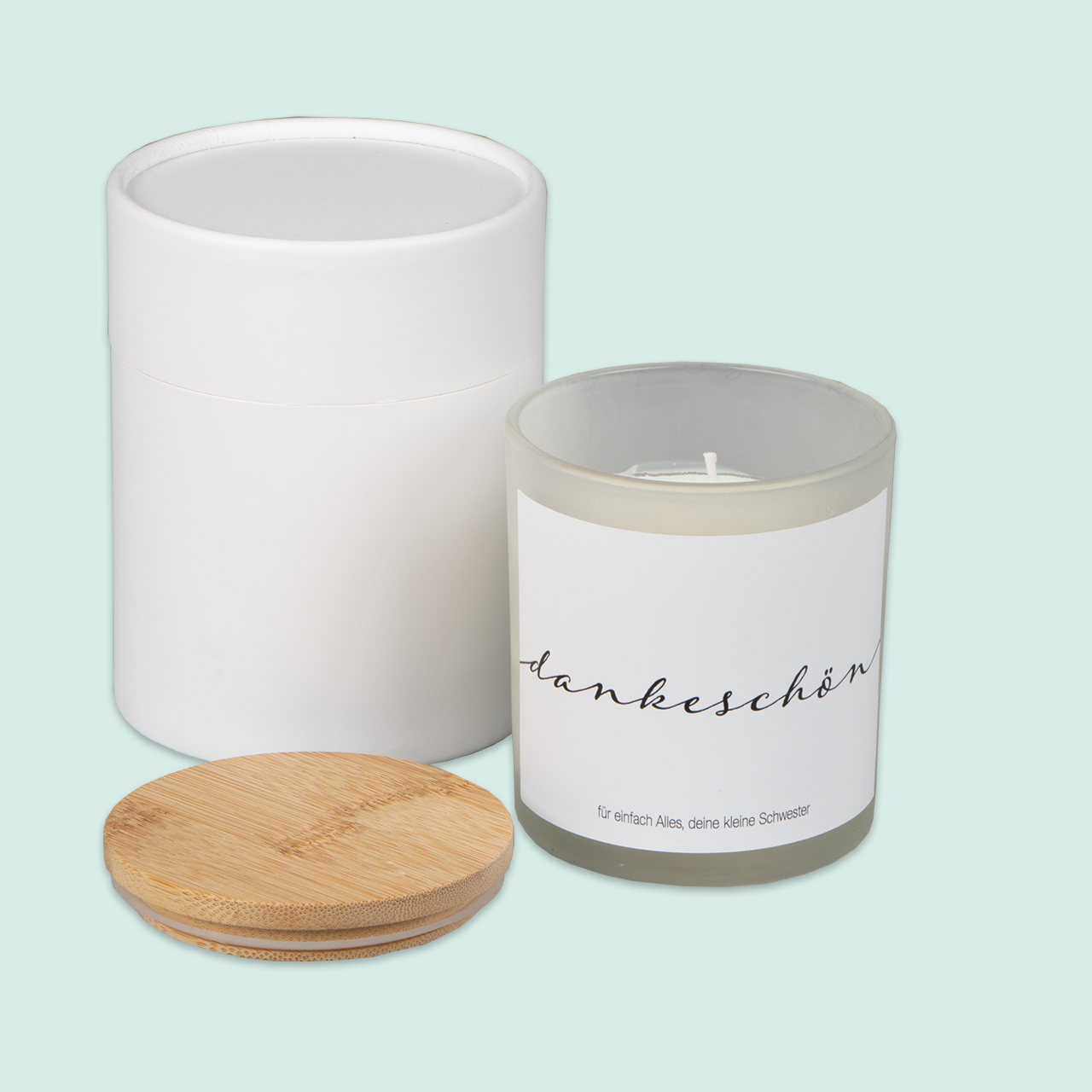 Eine personalisierte Kerze mit schlichtem Dankeschön-Text und elegantem Design, ideal geeignet als besondere Geste.