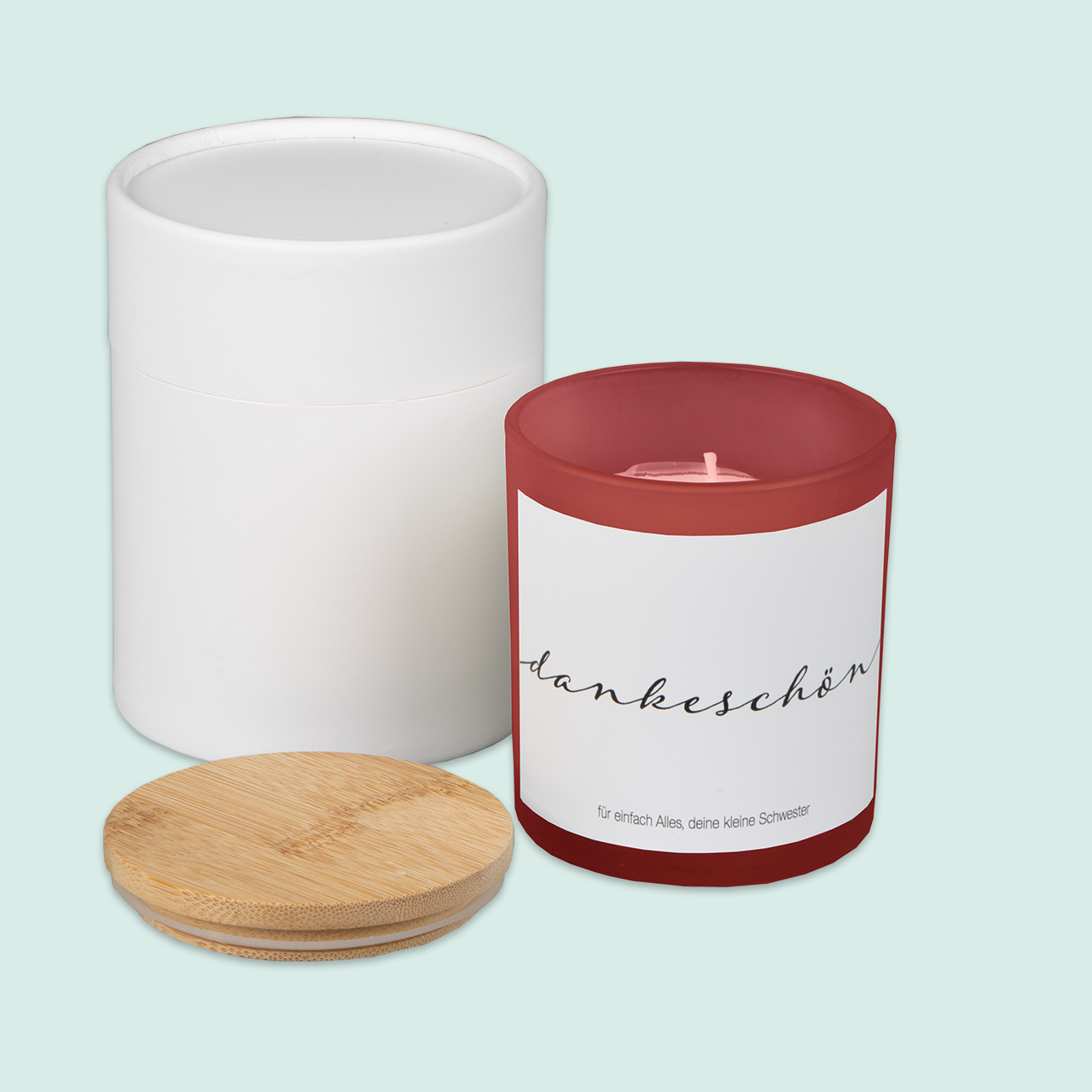 Dankeschön-Kerze personalisiert mit Text Eine personalisierte Kerze mit schlichtem Dankeschön-Text und elegantem Design, ideal geeignet als besondere Geste.
