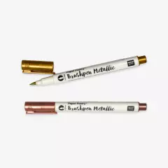 Geöffnete Brushpens in Metallicfarben mit einer flexiblen Spitze, gezeigt in Gold und Roségold.