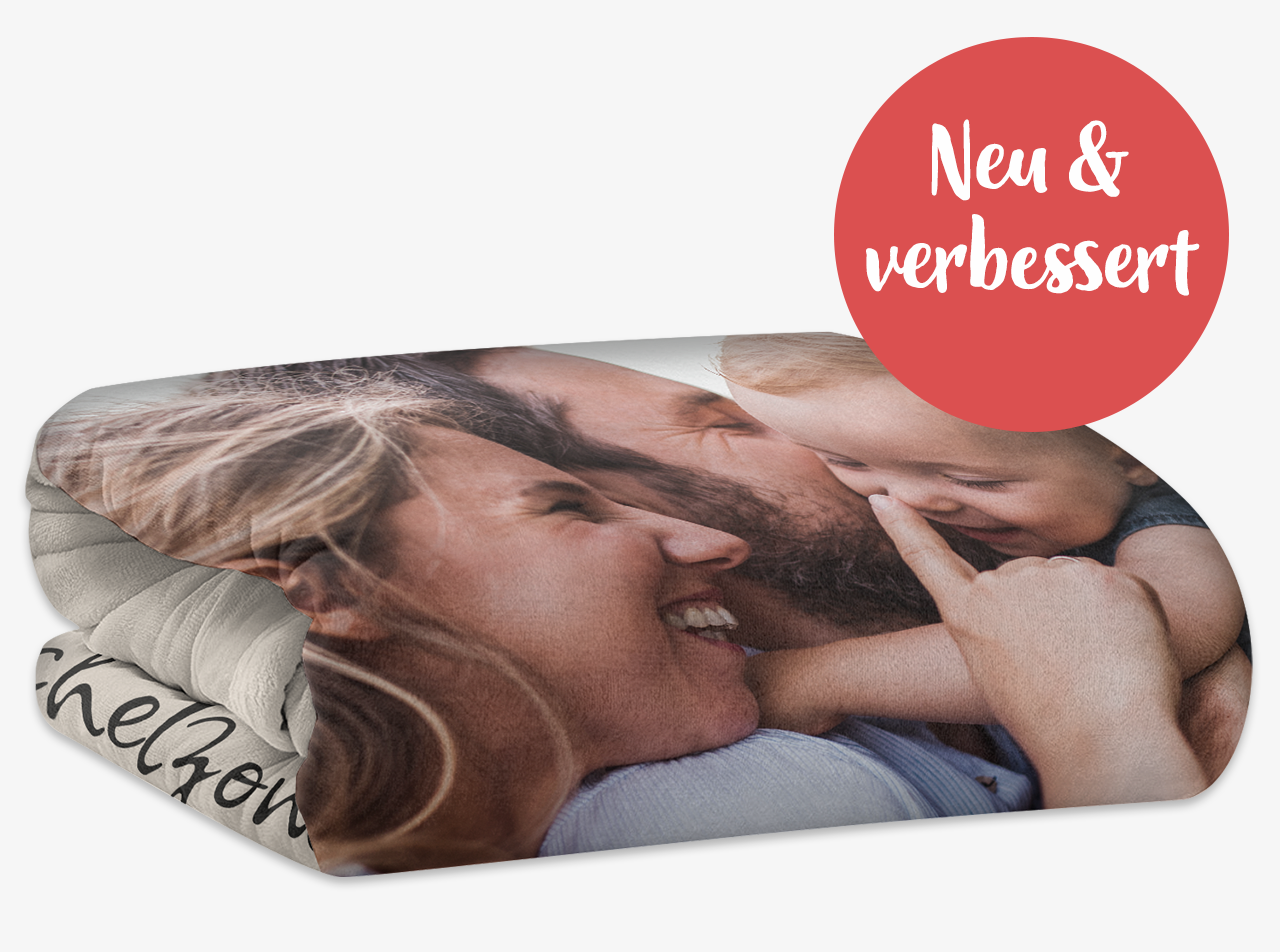 Gefaltete Premium Kuscheldecke mit Foto und Störer „Neu & verbessert“